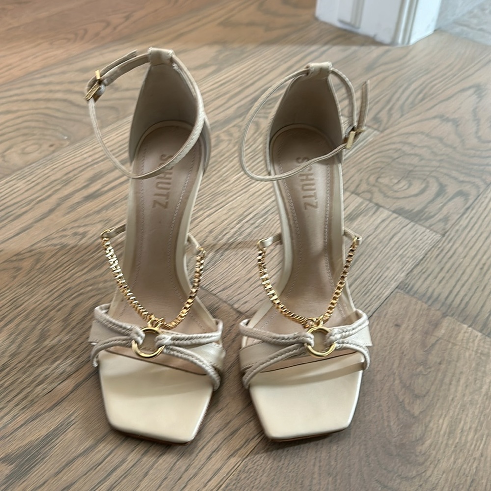 SCHUTZ Cream Heels with Gold Chain Detail